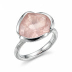 Front view of the 925 sterling silver natural rose quartz lotus cocktail ring with a branch-textured shank in Dubai.