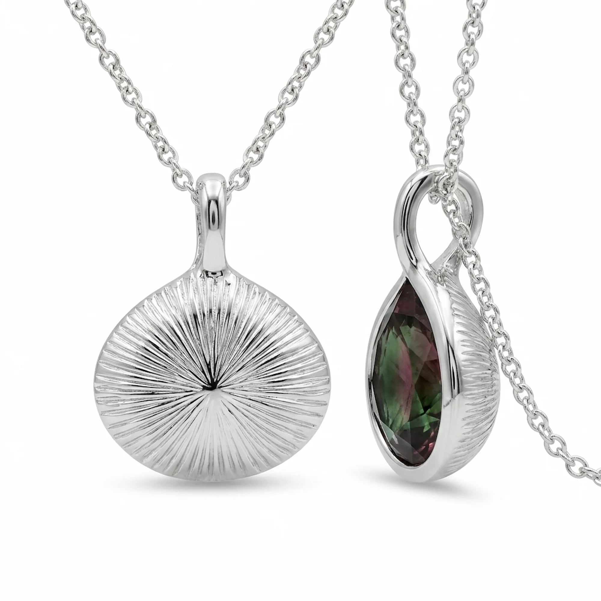 Reversible 925 sterling silver watermelon tourmaline simulant lotus pendant showing the engraved sunburst, Dubai.