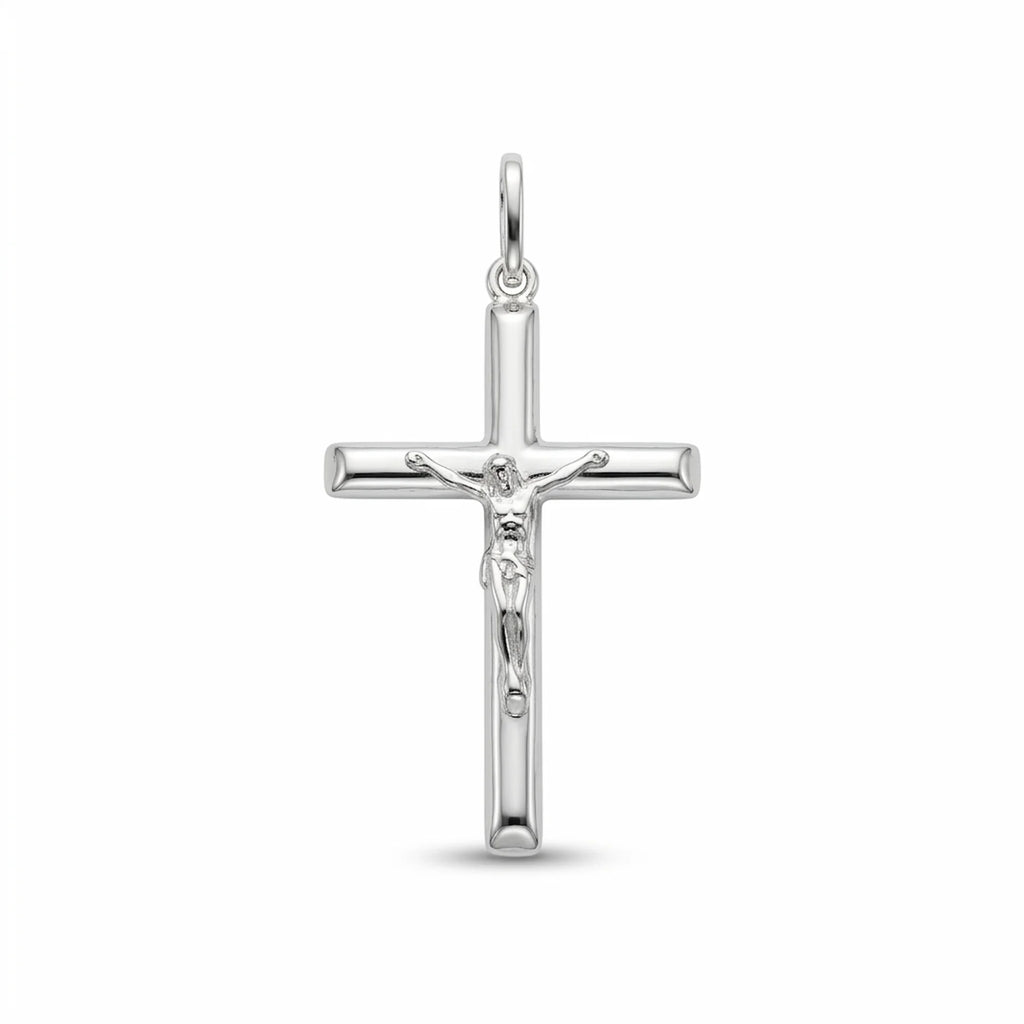 Small solid 925 sterling silver crucifix pendant for women with rounded tubular cross and raised Corpus on white background.