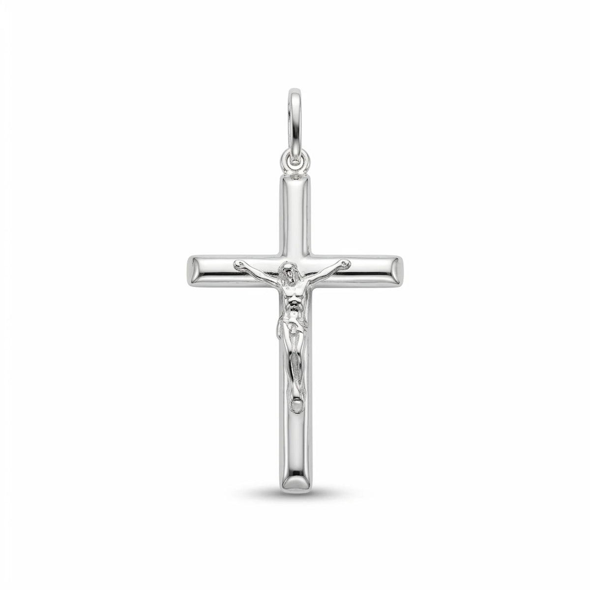 Small solid 925 sterling silver crucifix pendant for women with rounded tubular cross and raised Corpus on white background.