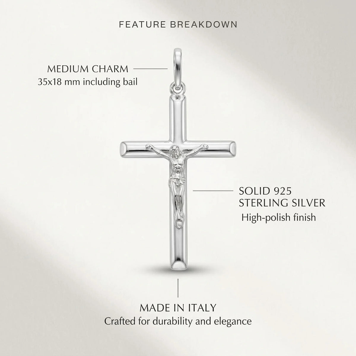 Small 925 sterling silver crucifix pendant size infographic showing 35 × 18 mm, solid construction, mirror-polished finish and Made in Italy origin.