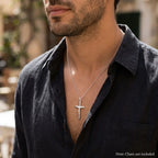 Man wearing a small solid 925 sterling silver crucifix pendant, chain not included.