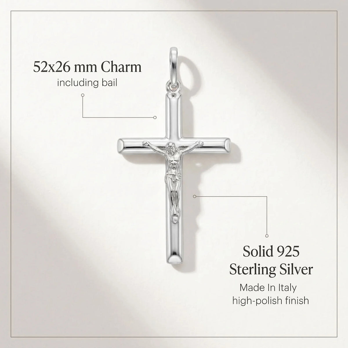 925 sterling silver crucifix pendant size infographic showing 52 × 26 mm, solid construction and Made in Italy origin.