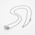 Stardust pavé CZ bead necklace in 925 sterling silver on white background, lobster clasp and cable chain visible