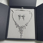 Rhodium-plated cubic zirconia statement waterfall necklace and earring set presented in a luxury gift box in Dubai.
