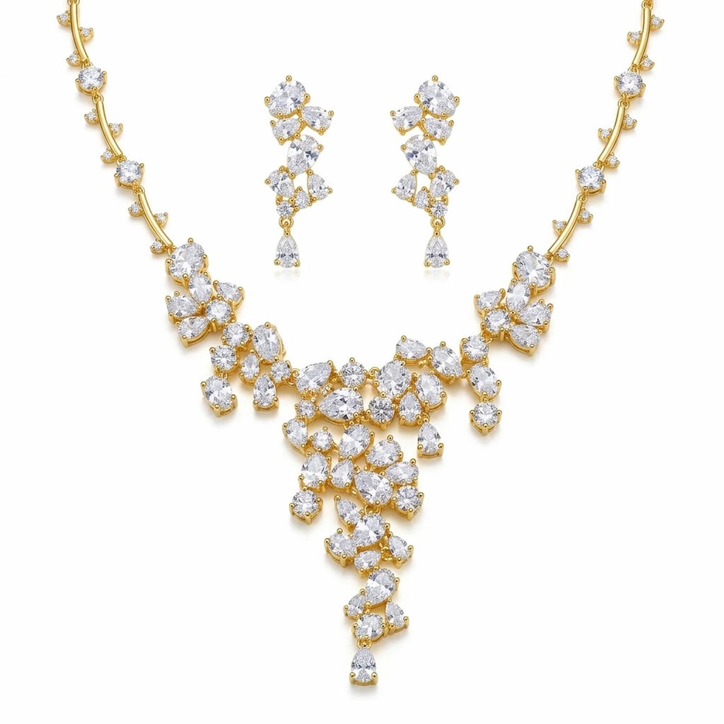 18k gold-plated cubic zirconia statement waterfall Y-necklace and earrings set displayed on a white background in Dubai.