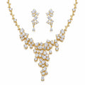 18k gold-plated cubic zirconia statement waterfall Y-necklace and earrings set displayed on a white background in Dubai.