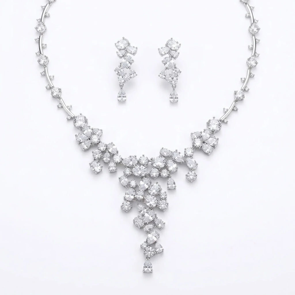 Statement waterfall Y-necklace and earrings set in rhodium-plated cubic zirconia, displayed on a white background in Dubai.