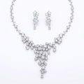 Statement waterfall Y-necklace and earrings set in rhodium-plated cubic zirconia, displayed on a white background in Dubai.