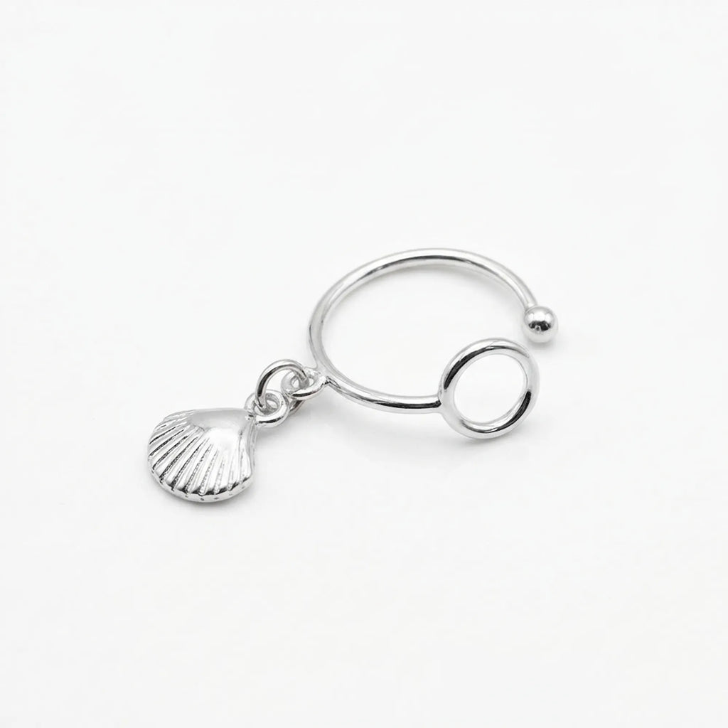 Close-up upright angle of the sterling silver ear cuff no piercing, showcasing the bright polish finish and the secure circular grip.
