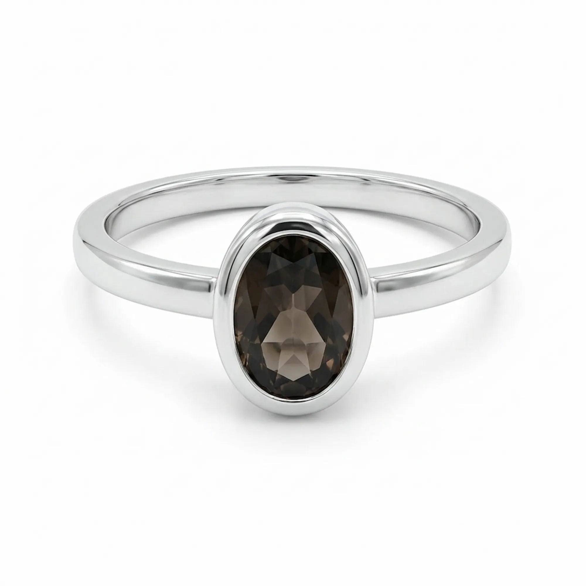 sterling silver ring with smoky quartz shown from alternate angle highlighting oval cut and clean stackable rings profile
