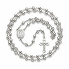 Italian sterling silver rosary beads with solid 4 mm rounds, oval Miraculous Medal and large openwork crucifix on white background.