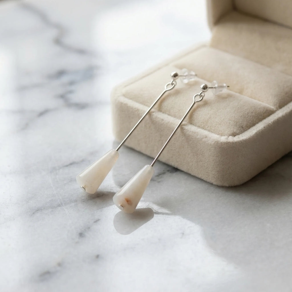 Sunset Onyx silver drop earrings by a cream gift box on marble, gift-ready from Luna Dura Dubai