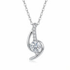 Swirl arc pendant necklace in 925 sterling silver with round CZ solitaire and pavé arm, white background