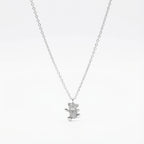 Pavé CZ teddy bear pendant necklace in rhodium 925 sterling silver — full stone coverage on bear form, cable chain and lobster clasp on white background