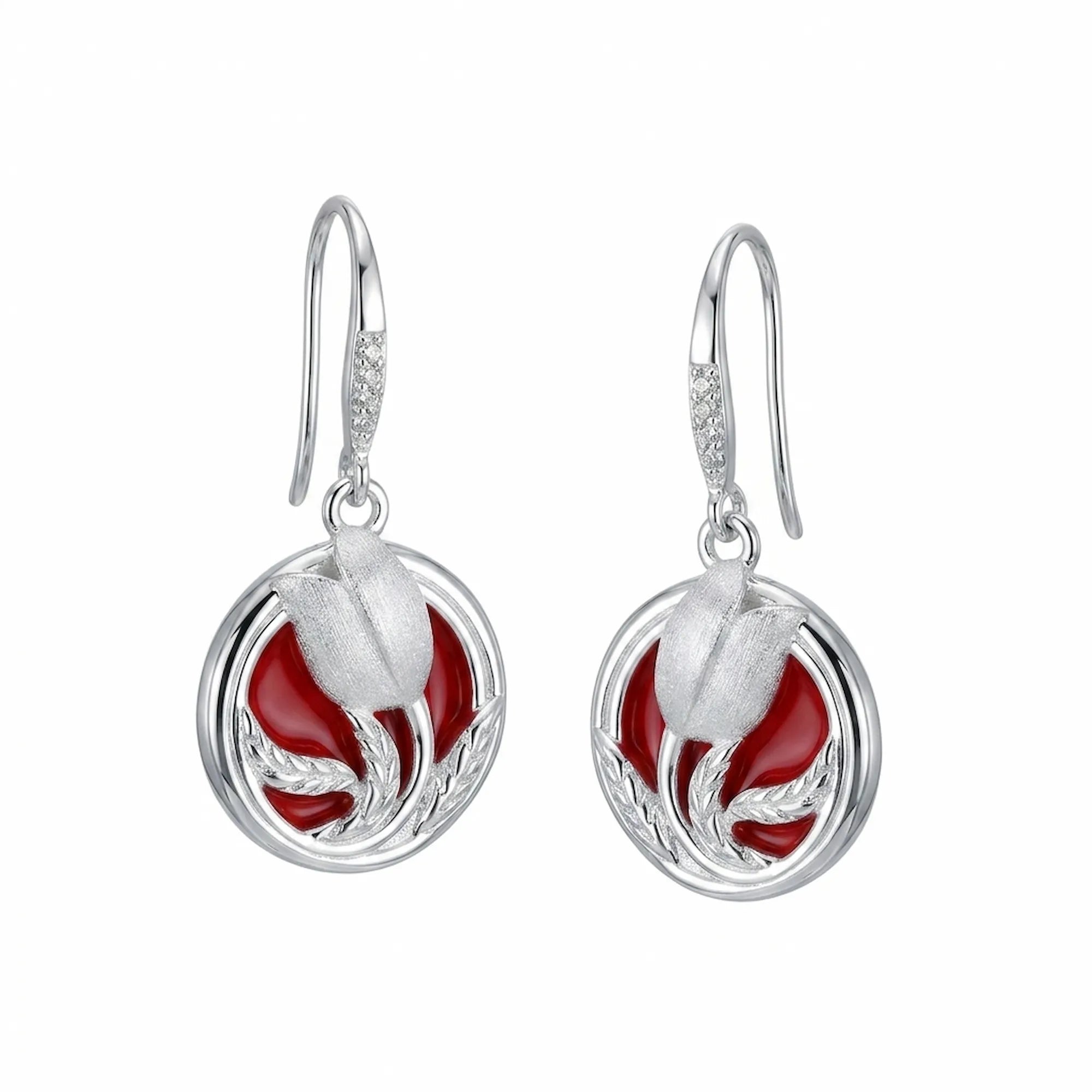 Pair of 925 sterling silver tulip drop earrings with deep red enamel circular disc on white background