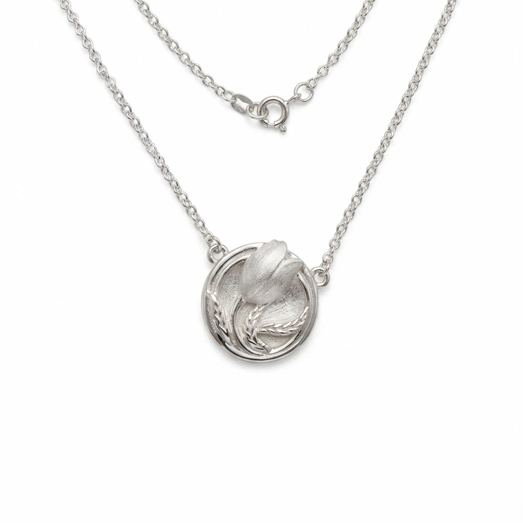 Tulip medallion necklace on white — satin 925 silver sculpted tulip bud pendant, cable chain and spring ring clasp