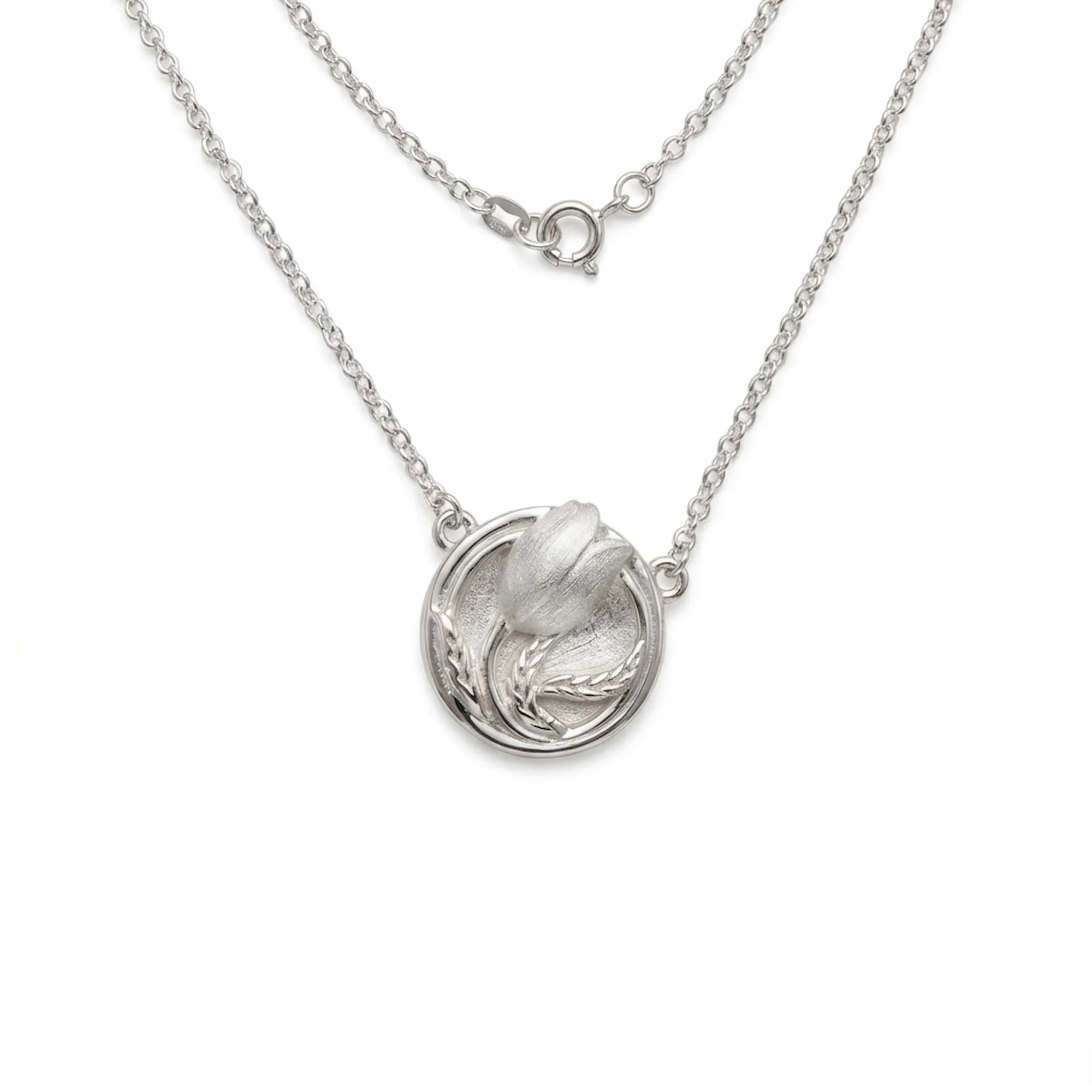 Tulip medallion necklace on white — satin 925 silver sculpted tulip bud pendant, cable chain and spring ring clasp