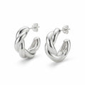 Sculptural twisted 925 sterling silver hoop earrings on white background — 15mm, post-back closure, hollow-backed form.