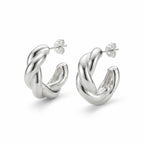 Sculptural twisted 925 sterling silver hoop earrings on white background — 15mm, post-back closure, hollow-backed form
