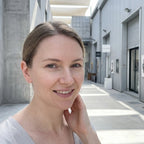 Model wearing large silver zigzag geometric hoops at Alserkal Avenue, Dubai.